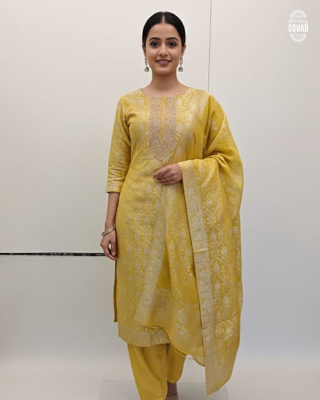 The Brocade Brilliance: Luxurious Metallic Ensembles with Hand-Inspired Machine Work.