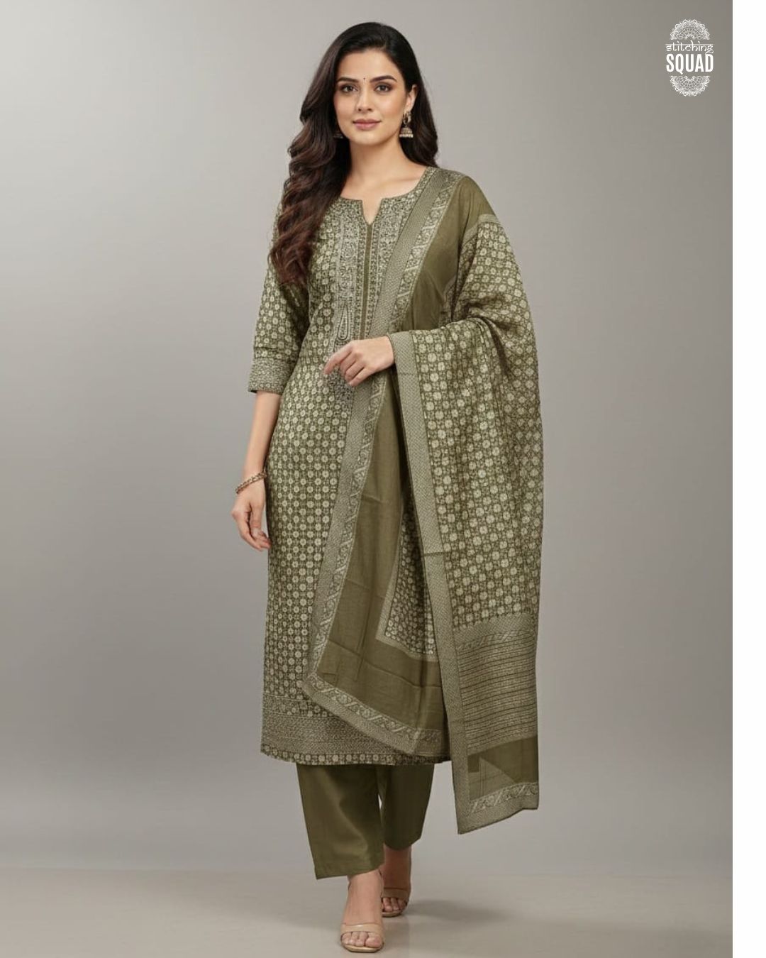 The Gilded Brocade: Woven Elegance with Machine-Embroidered Yoke.