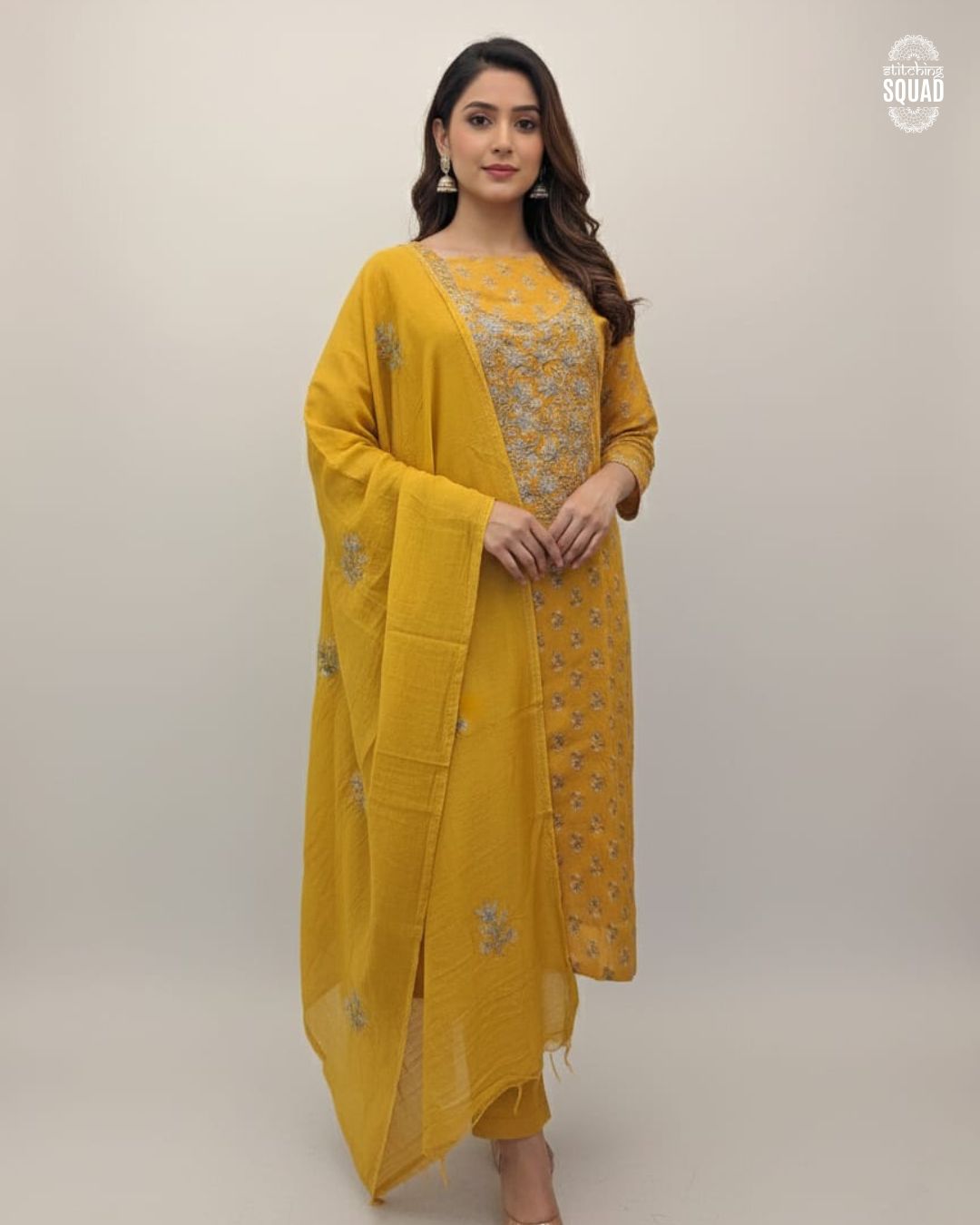 Festive Cotton Suit with Highlighted Embroidered Yoke