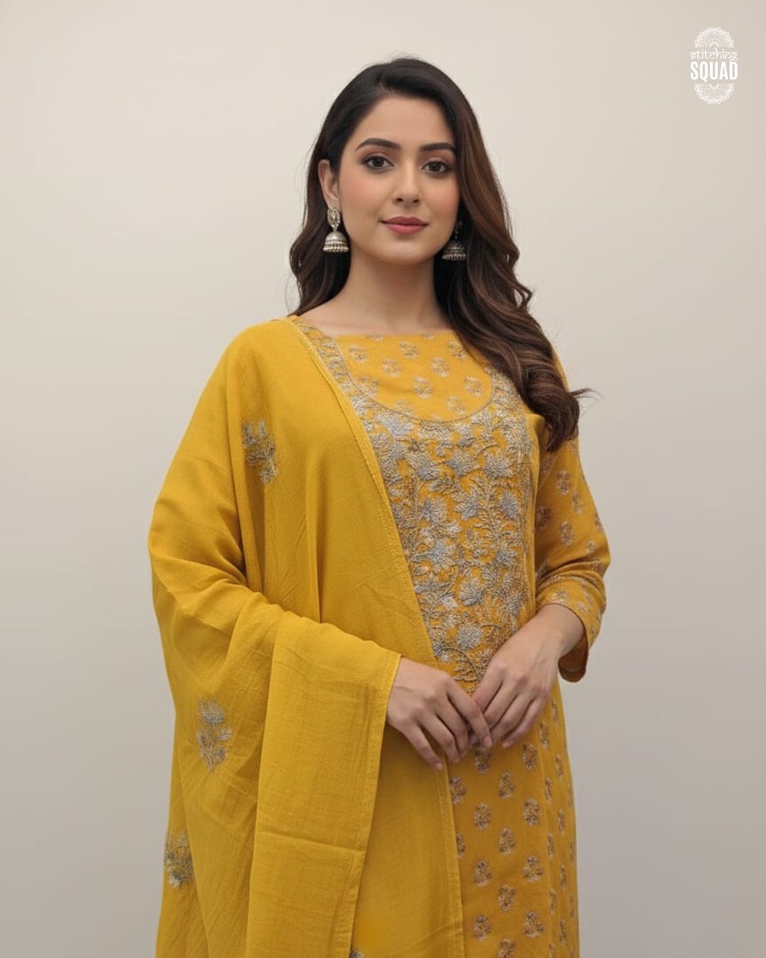 Festive Cotton Suit with Highlighted Embroidered Yoke