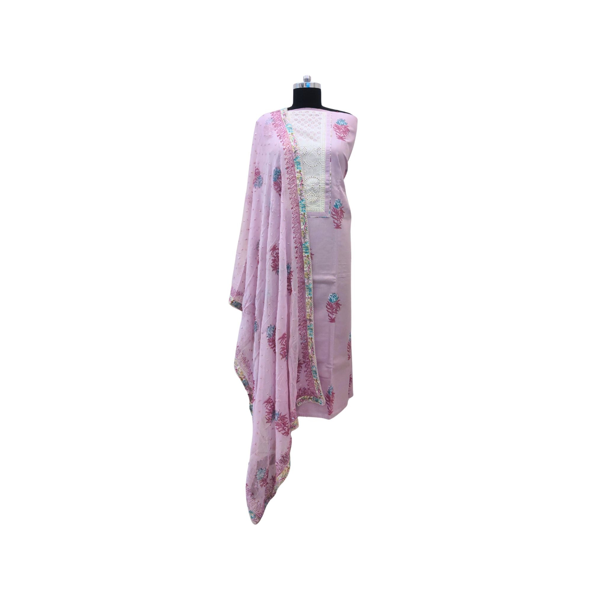 Traditional charm meets modern elegance – cotton suits for women with intricate machine embroidery yoke.