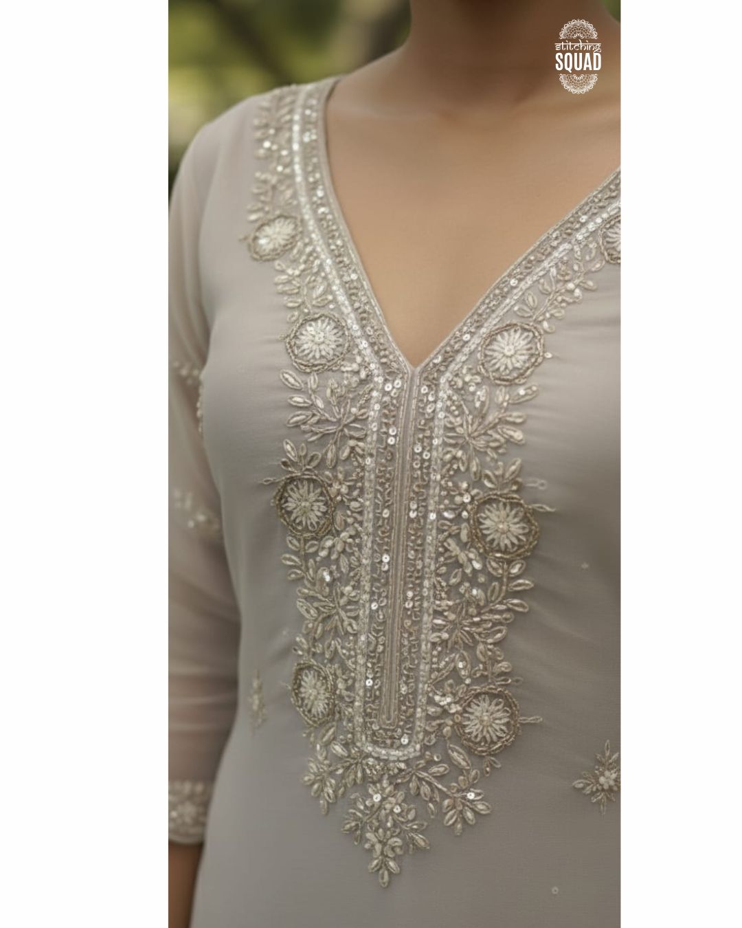 A STATEMENT OF GRANDEUR IN HEAVILY EMBROIDERED TISSUE ORGANZA