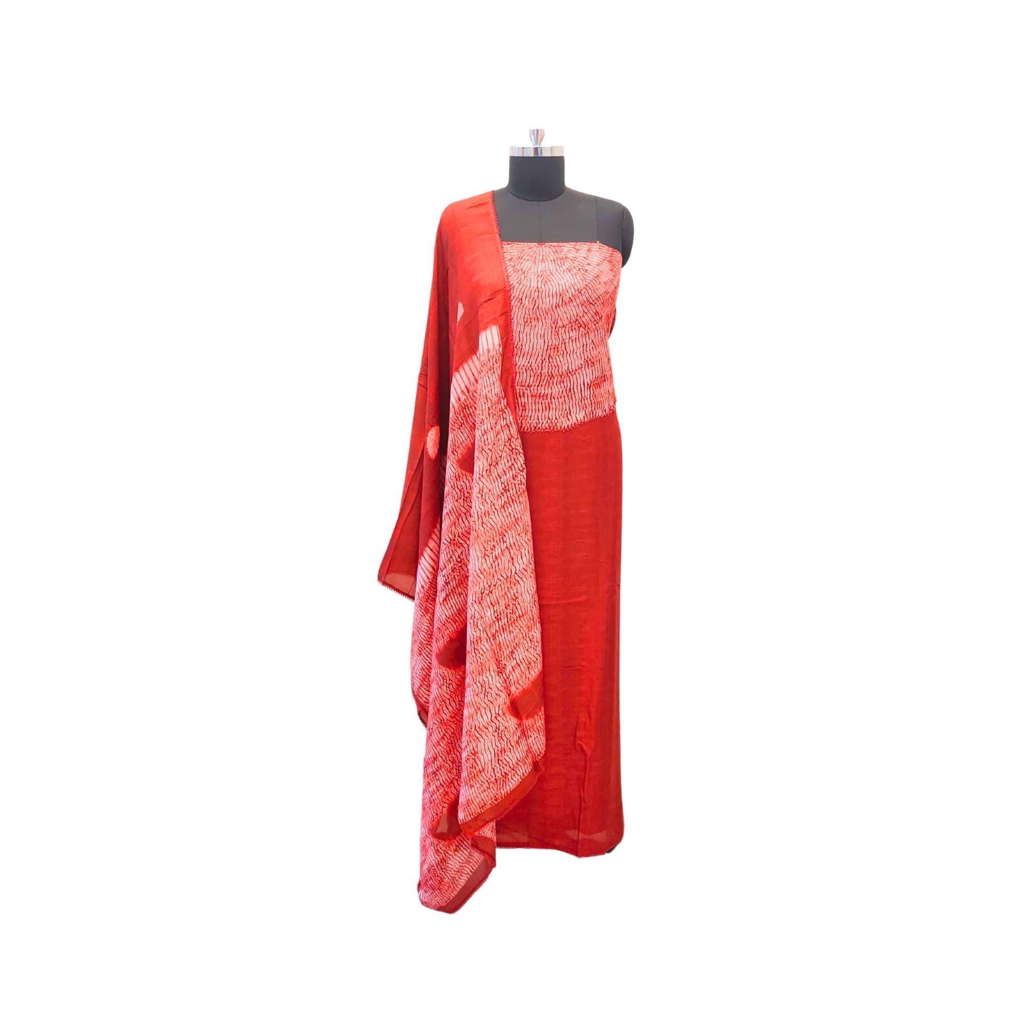 Soft muslin suit with elegant Shibori-style yoke, paired with a full Shibori dupatta — effortlessly chic