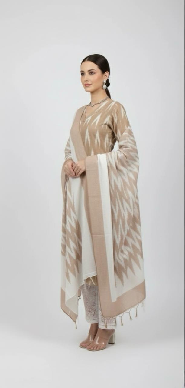 Embrace tradition with this beautifully crafted Ikat print cotton suit.